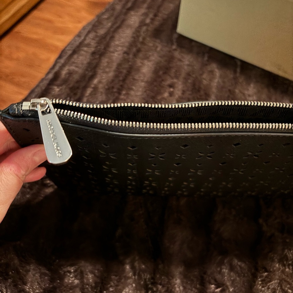 Michael Kors Women’s Floral Perforated Large Zip Clutch - Picture 8 of 13